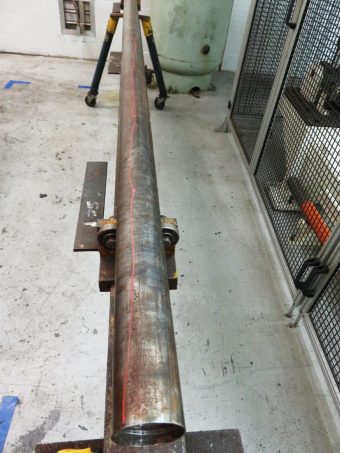 Quarter-turn spiral wear pattern along length of rod, with box end heat check cracking